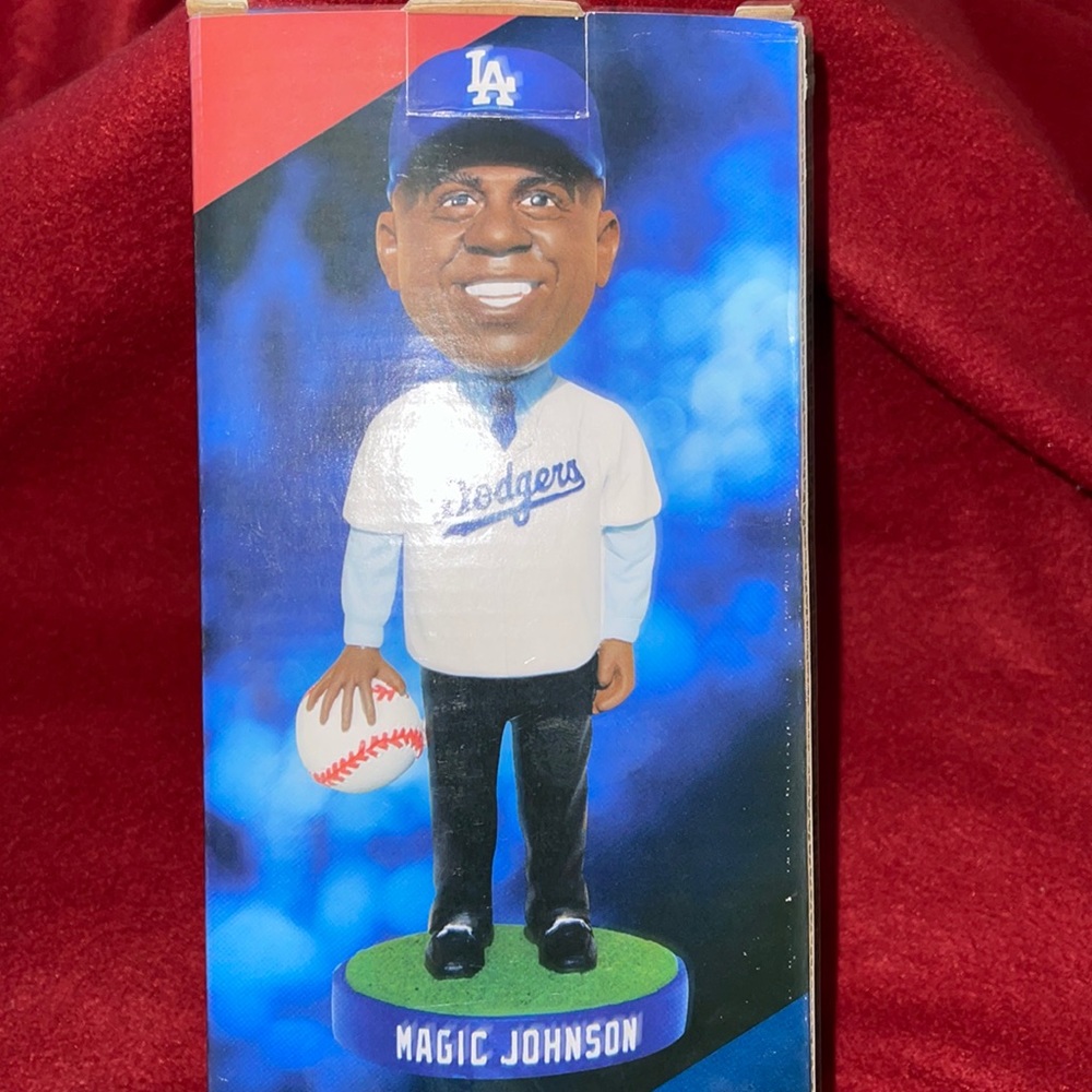 Magic Johnson with Dodger’s jersey on.